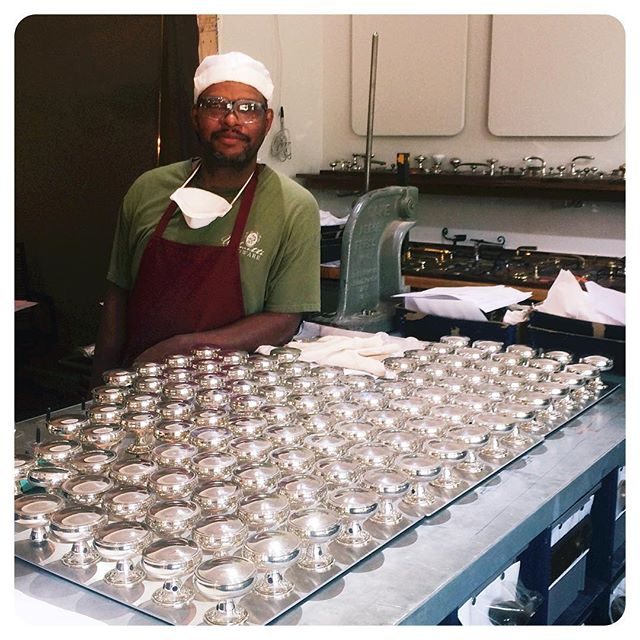 Here is James standing proud by the gorgeous silver knobs he finished for a new home in Wayzata, MN