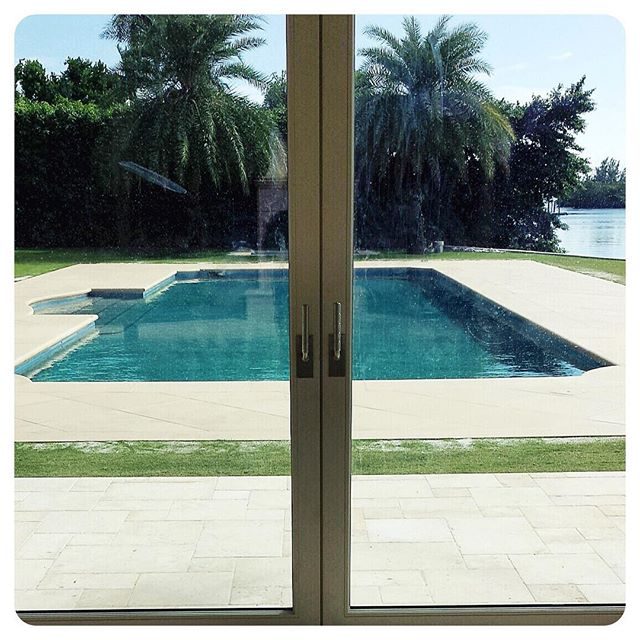 waldorf lever on a pair of lift and slide glass doors in Palm Beach, Florida