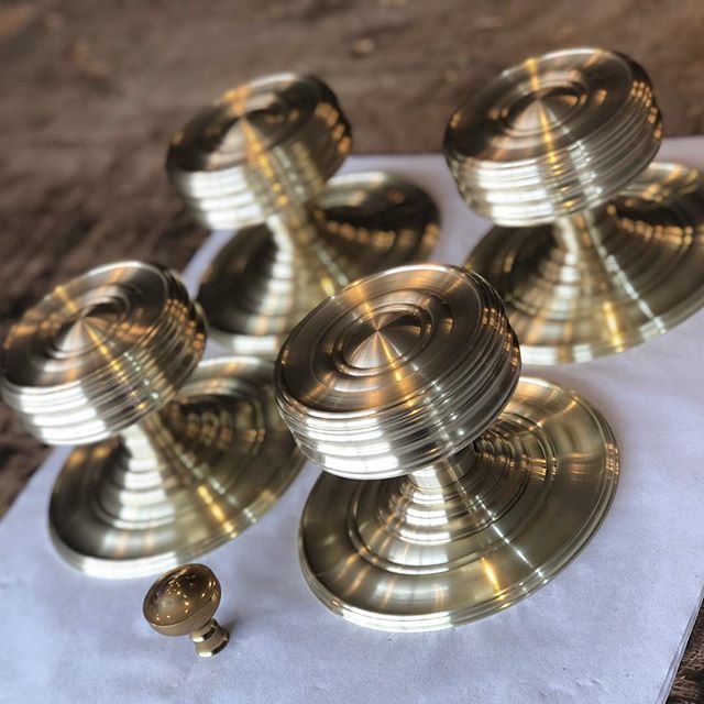 center knobs for entry doors - each weighing in at about 8 lbs of solid brass!